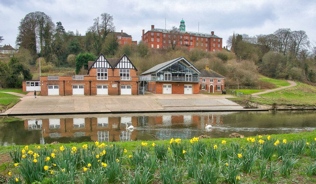 Shrewsbury School and Boat House with River Severn in foreground.